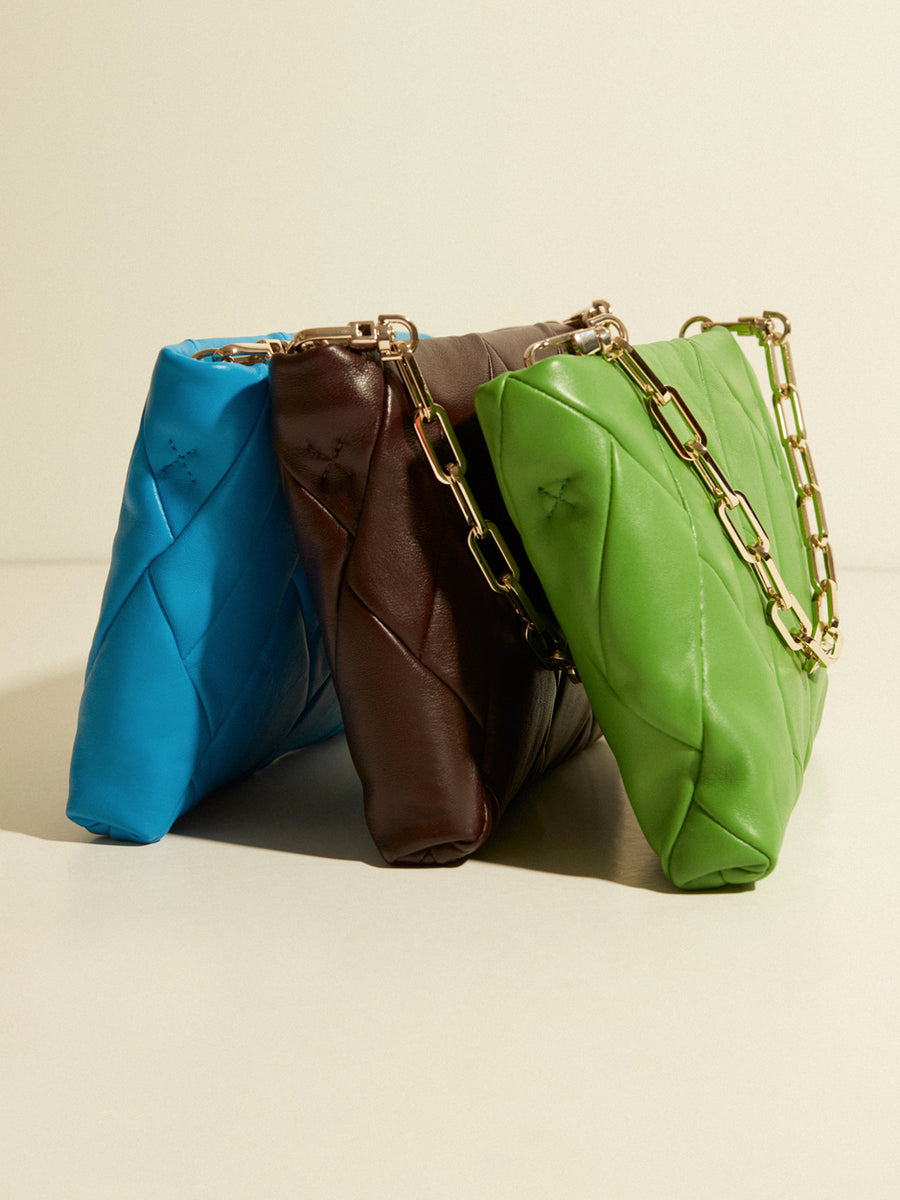 RECO Crossbody pouch bag CUBO crafted from light green paneled leather the perfect gift for ladies with a colorful and original design 