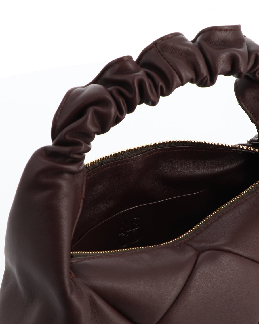 RECO handbag DIDI HOBO chocolate crafted from dark brown leather panels showing inside capacity lined in leather with a patch interior pocket and fastening closing 