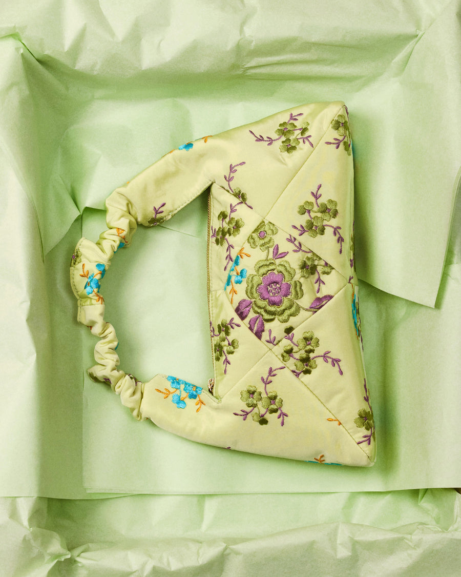 RECO handbag DIDI HOBO crafted from pastel green embroidered satin features no logo outside and an original and feminine patchwork design 