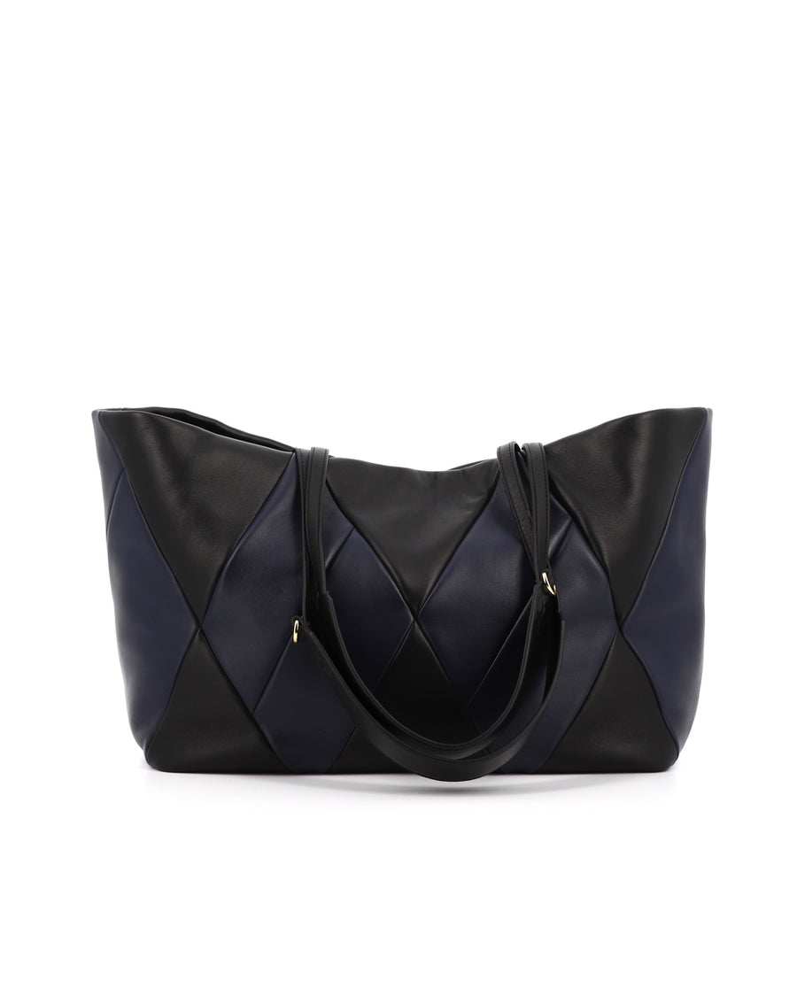 RECO handbag TRIXI crafted from black and dark blue paneled leather with its two black handle made in calfskin leather