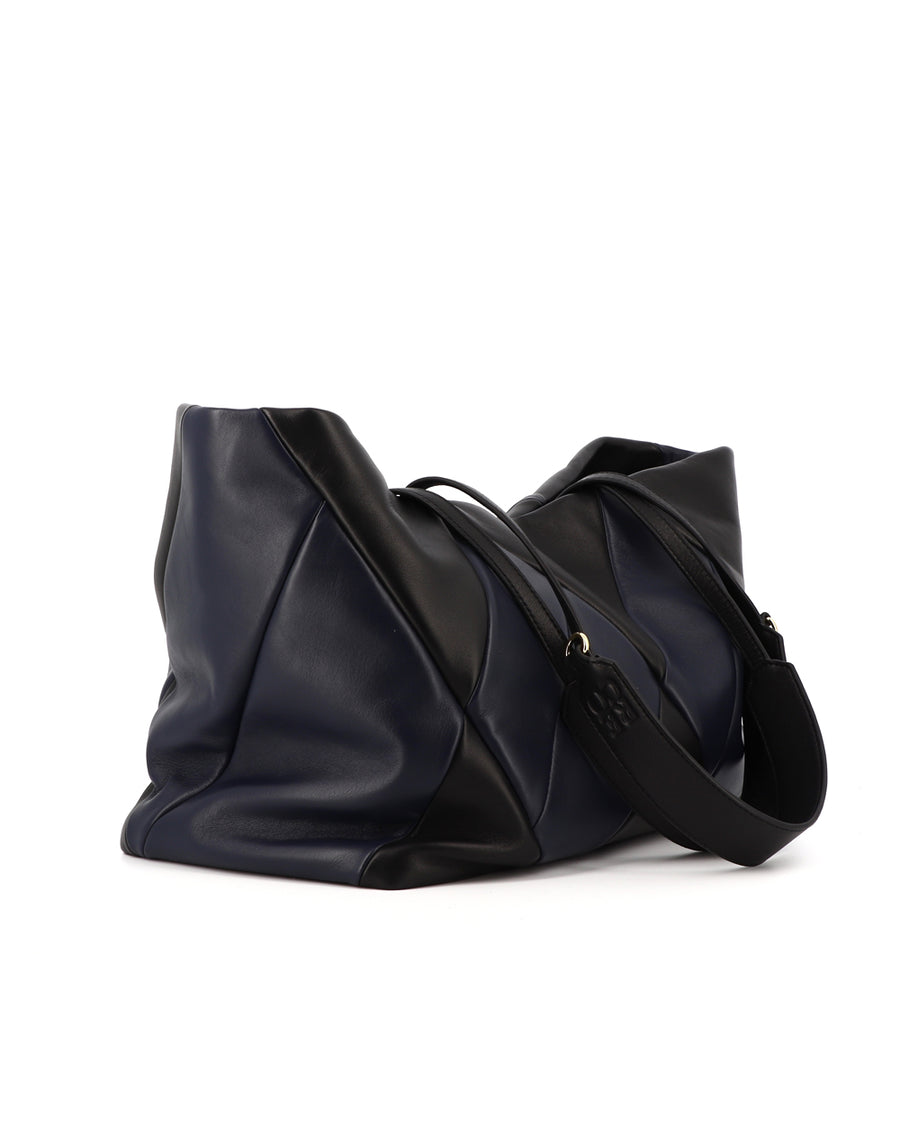 RECO handbag TRIXI crafted from black and dark blue paneled leather from Spanish and Italian leather with an artisanal and sustainable process 