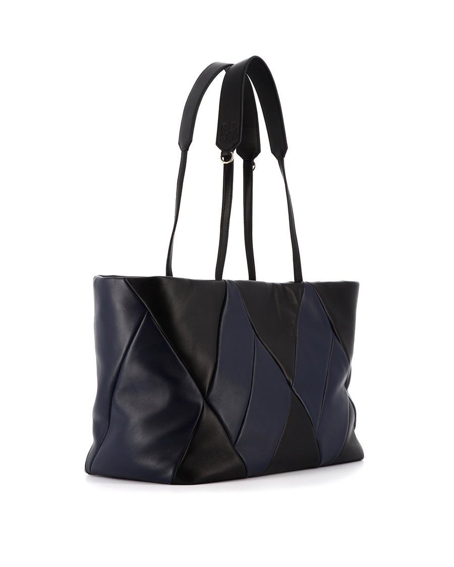 RECO handbag TRIXI crafted from black and dark blue paneled leather with its two black handle made in calfskin leather ideal for versatile use