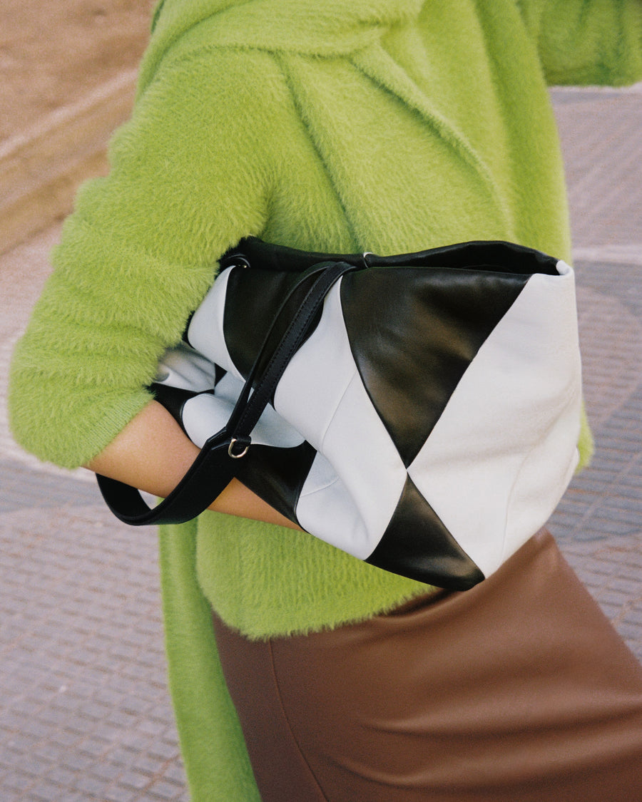 RECO Paris TRIXI handbag in brown and light blue patchwork leather, a lightweight and versatile everyday bag.